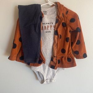 Girl’s onesie pants and sweater set.
